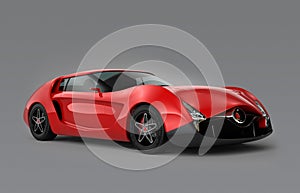 Red sports car on gray background