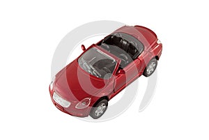 Red sports toy car with clipping path