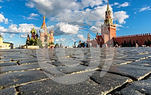 Red Square with Kremlin in summer, Moscow, Russia. Old cobblestones of main Moscow square close-up for background