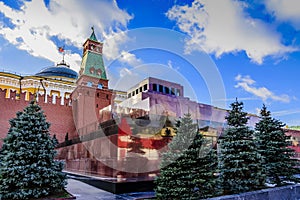 The Red Square. Lenin Mausoleum and the Kremlin Senate Tower at sunset of a sunny day in late autumn. Moscow, Russia.