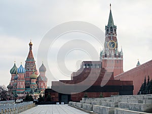 Red square in Moscow. Visible wall and towers of the Kremlin, Lenin Mausoleum and St. Basil's Cathedral