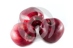 Red stark apples isolated on white background