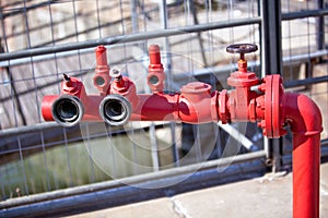 Red steel fireplug on a street