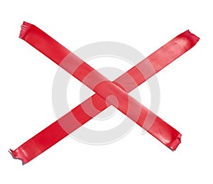 Red sticky tape criss-cross on a white isolated background