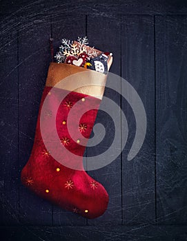 Red stocking with Christmas presents