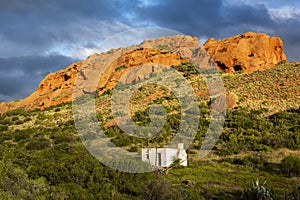 Red Stone Hills, Calitzdorp Farm in the Karoo with , valleys pastures aloes and the swartberg mountains in south africa.