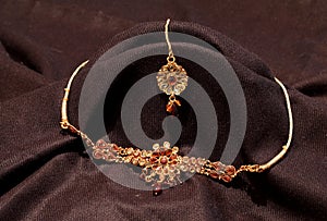 kundan jewelry in black background photo