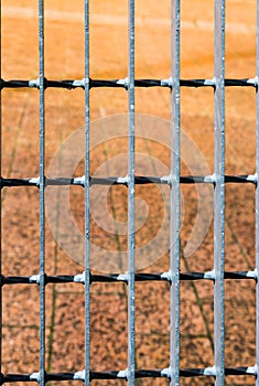 Red stone pavement behind bars background