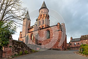 A red stone Roman church in Correze, France