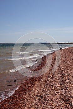 Red stone shoreline on Sakakawea Lake