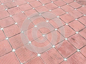 Red stone tile pattern.