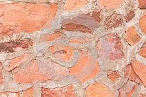 Red stone wall outdoor background and texture of decorative Slate Stone