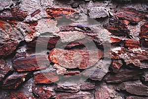 Red stone wall texture close-up