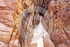 Red stone walls of Redang Island