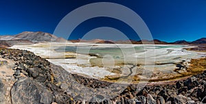 Red stones and Talar salar panorama in Atacama photo