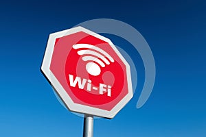 Red stop traffic sign forbidding the use of Wi-Fi and other wireless communication technologies like 5G