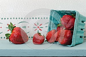 Red Strawberries on Blue Shelf