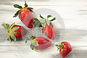 Red strawberries with green tails