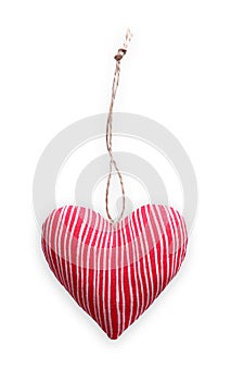 Red striped sewed pillow heart isolated on white background, valentine
