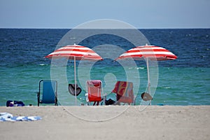 Red striped umbrella on Dania Beach, in Fort Lauderdale, Florida