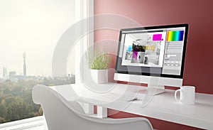 red studio with graphic design computer