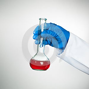 Red substance in lab bottle