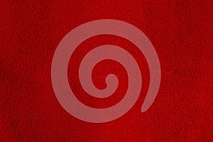 Red suede as a background material for designers. Red velvet background