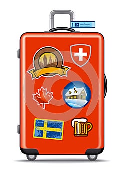 Red suitcase for travel with stickers