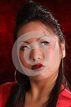 Red sultry asian look right