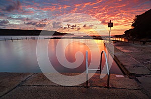 Red Summer Sunrise over Malabar Ocean Rock Pool Long Bay Austral