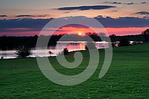 Red sunset over river in Gelderland