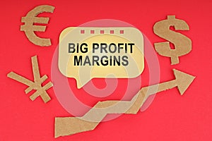 On the red surface there are money symbols, an arrow and a sign with the inscription - Big Profit Margins