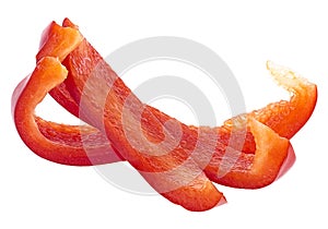 Red sweet bell pepper sliced strips isolated on white background. Red fresh paprika