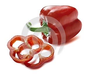 Red sweet pepper whole sliced pieces isolated on white