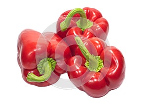 Red sweet peppers isolated on white