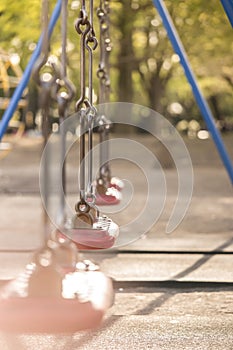 Red swing in the kindergarten of Asukayama park in the Kita dist