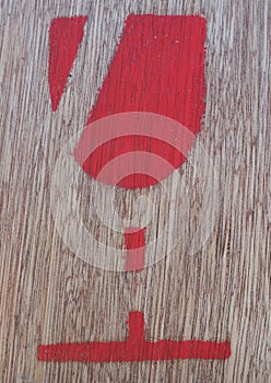 Red symbol on plywood