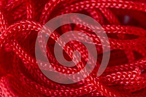 Red syntetic cord macro close-up