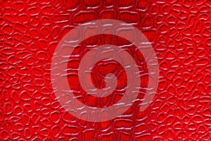 Red synthetic leather texture. Abstract background for design
