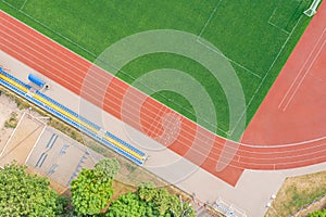 Red synthetic rubber running track on stadium