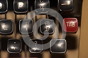 Red TAB key of a typewriter