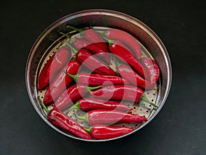Red Tabasco pepper in  Steiner to driying for  pickle Kalyan photo