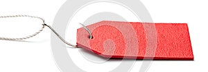 Red tag for sales on the fishing hook isolated on white background.