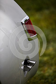 Red tail light of a classical vintage car