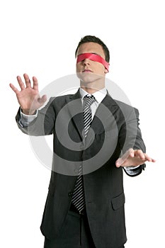 Red tape blindfold businessman isolated