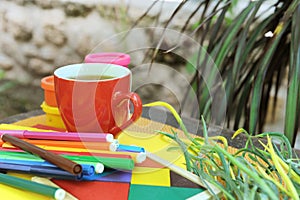 Red tea mug mockup, outdoor photo