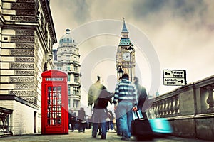 Red telephone booth and Big Ben in London, UK.