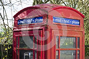 Red telephone booth box for email text and phone retro communication