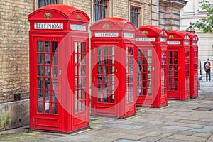 Red telephone booths in Covent Garden street, London, England