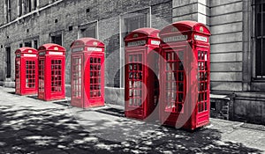 Red telephone booths in London, uk